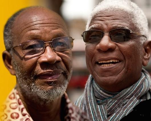 Celebrated Ghanaian contemporary artists Ablade Glover and El Anatsui, who are the subjects of a film to be shown at a free screening at the October Gallery Theatre in Bloomsbury on Saturday, Aug. 2. Image courtesy of October Gallery. 